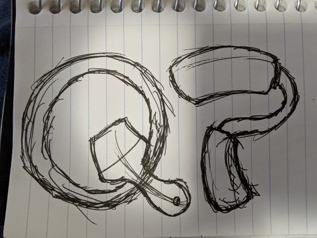 Pencil sketch in a notebook of the QP logo: a Q made from a paint-can lid and brush, and a P made from a roller
